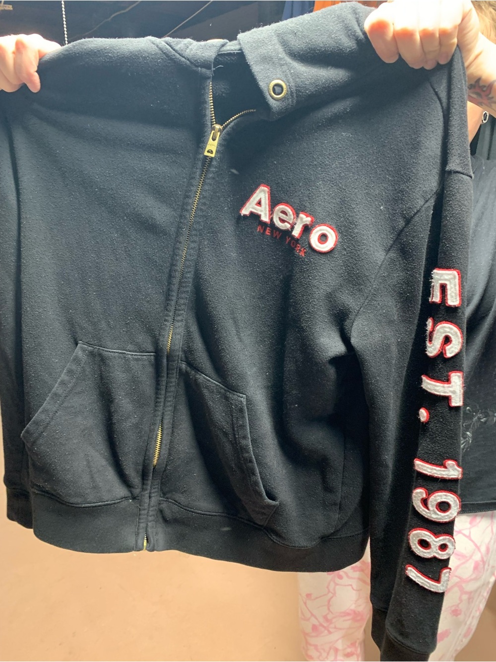 Aeropostale Black Zip-Up Hoodie with Red & White Embroidery hood
string missing